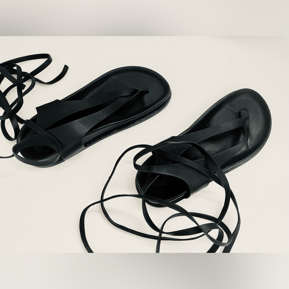 A. Emery Shel Sandal in black leather size 36.